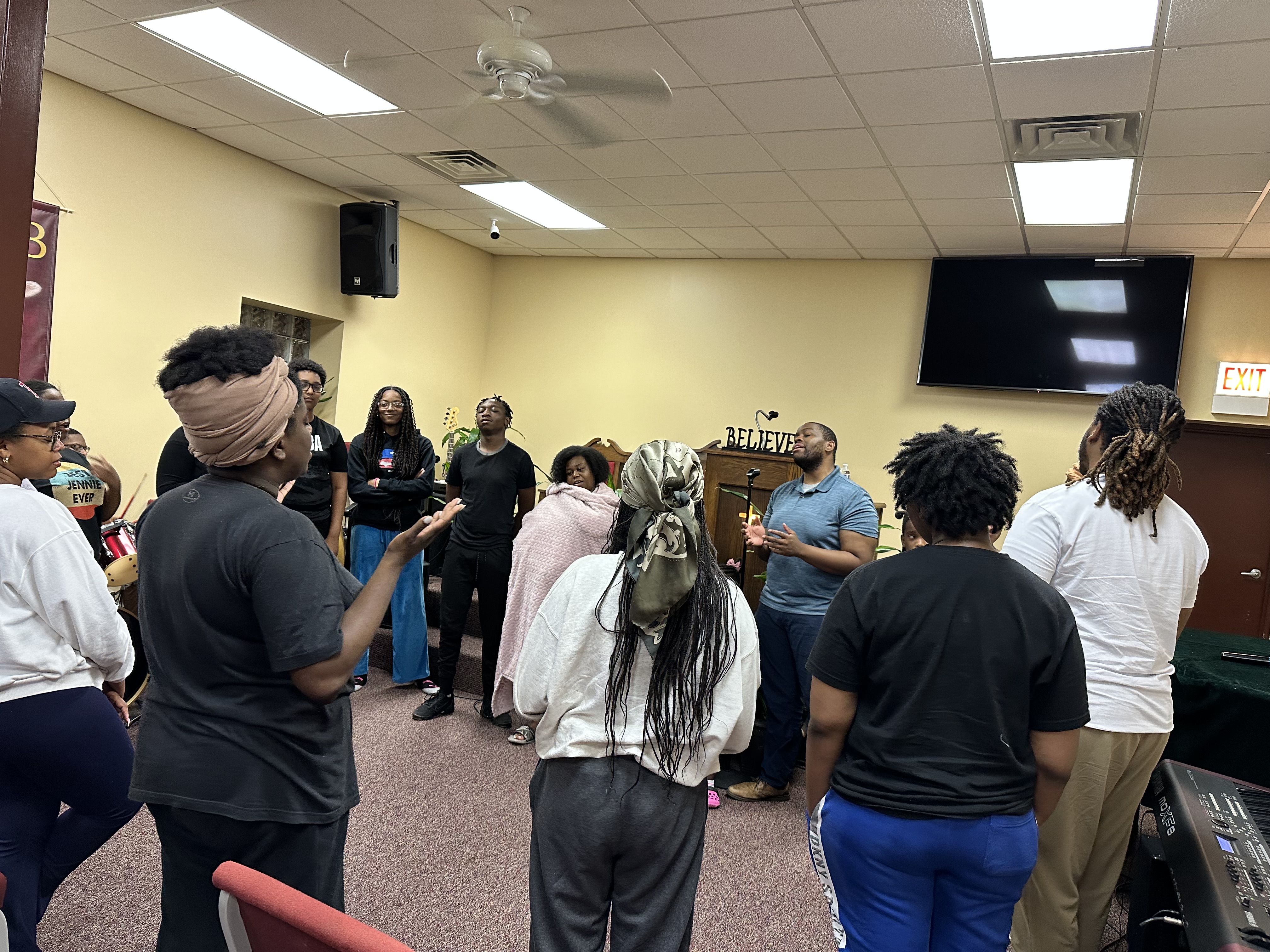 A tender embrace at New Jerusalem Evangelistic Church