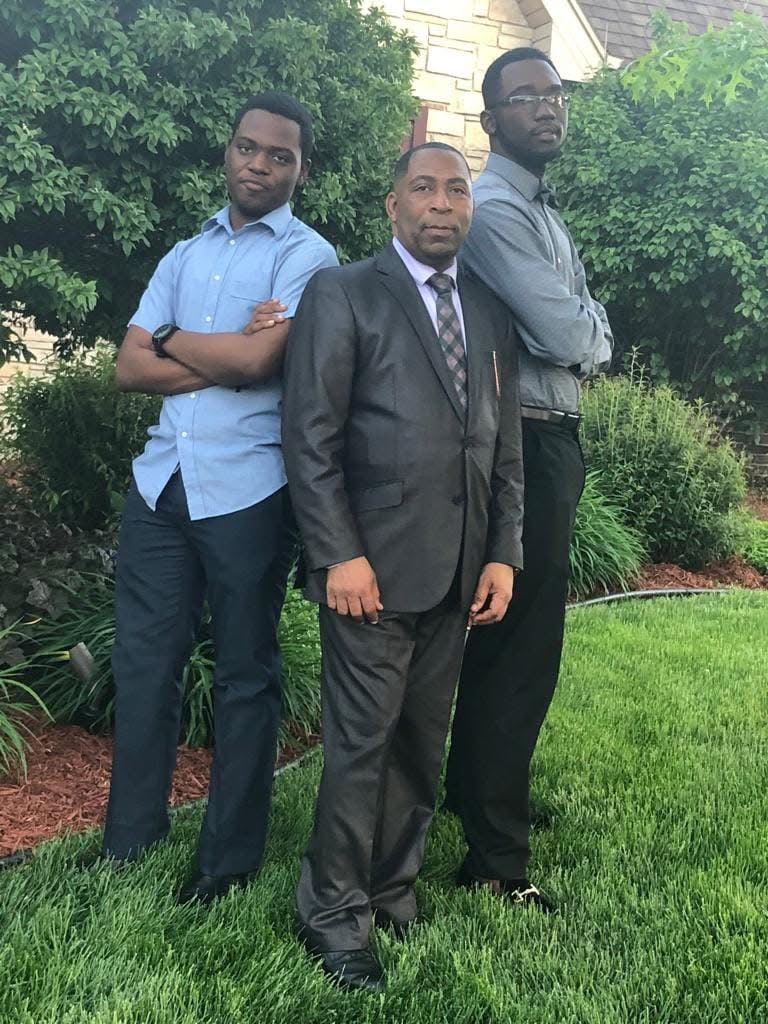 Three brothers of New Jerusalem dressed for Sunday