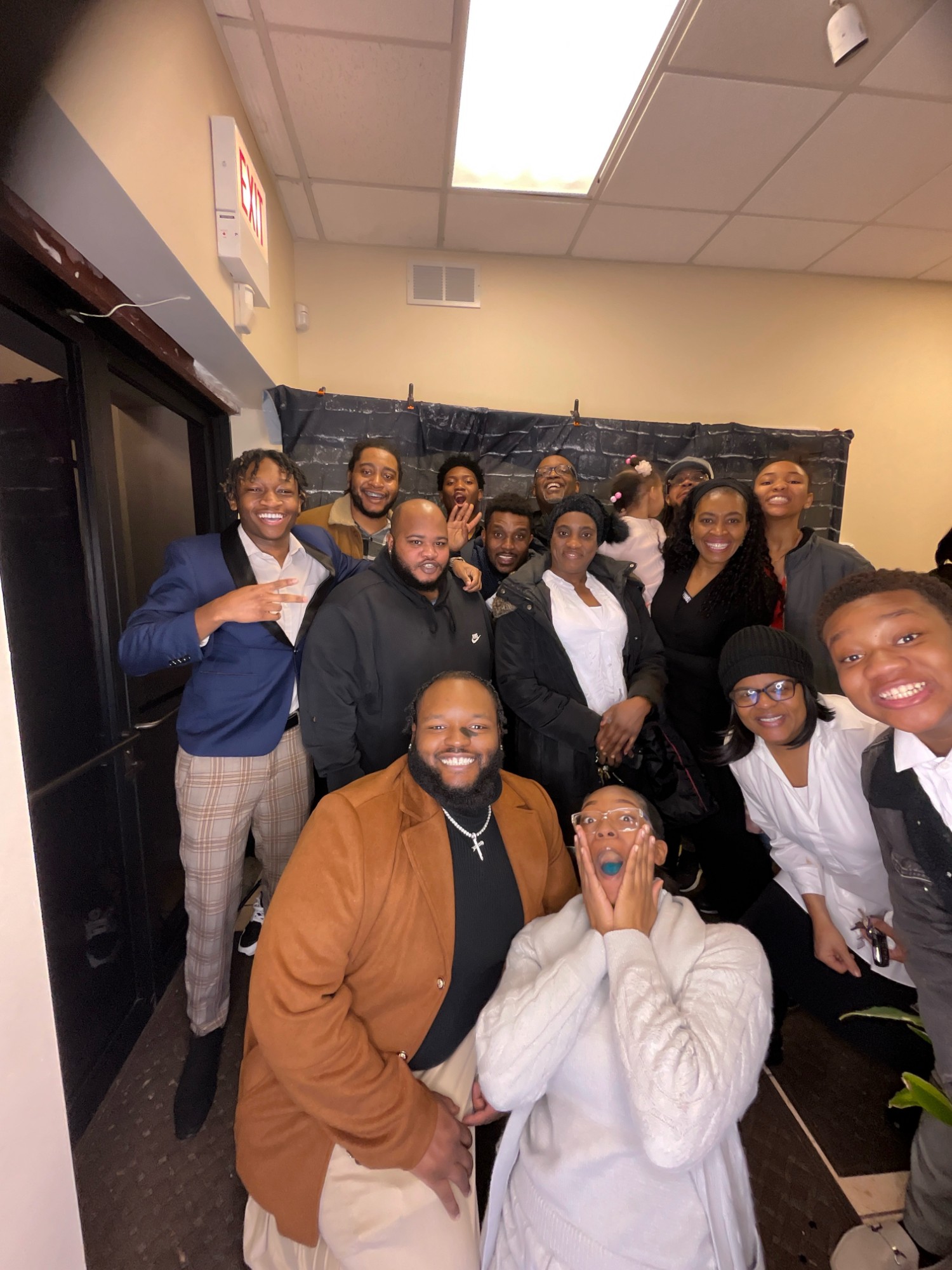 New Jerusalem church family gathered in the fellowship hall